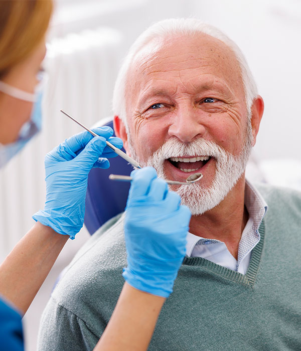 elderly person at dentist